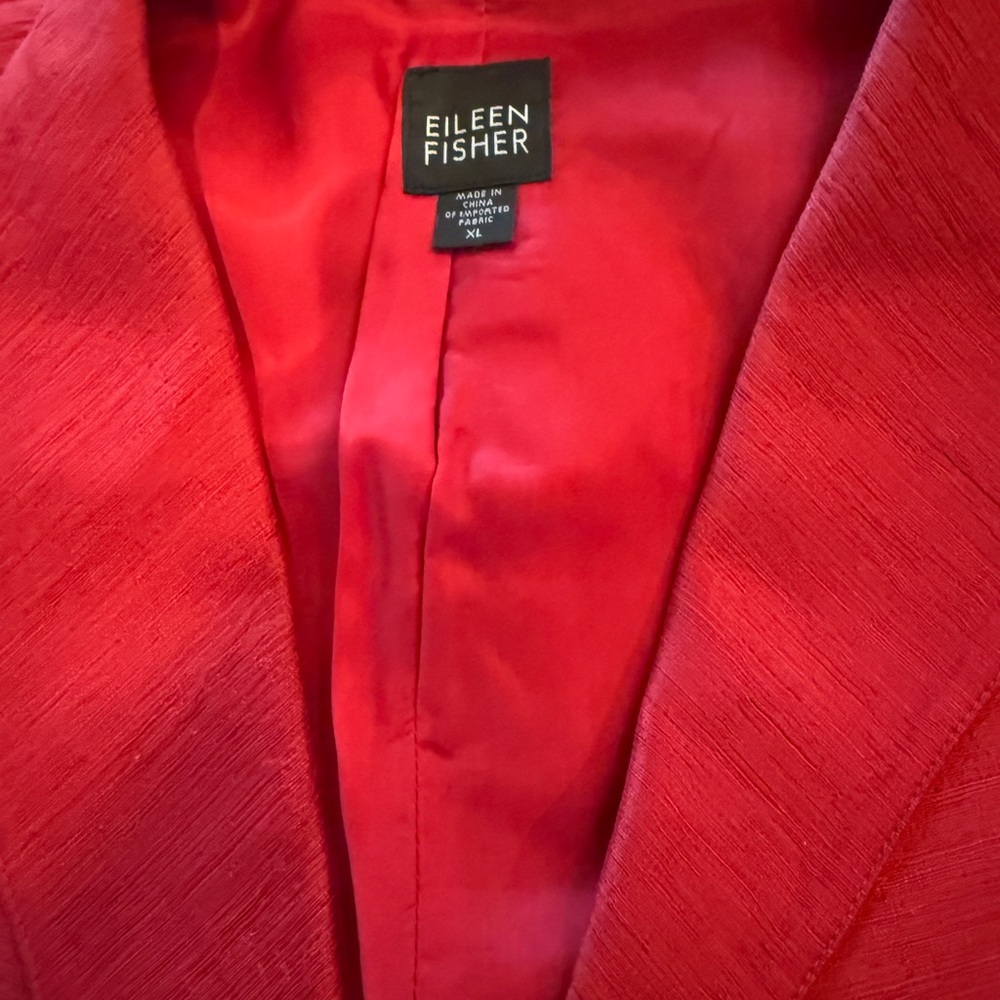 Eileen Fisher Vibrant Red Jacket, red silk tank, red silk button and zip jacket.